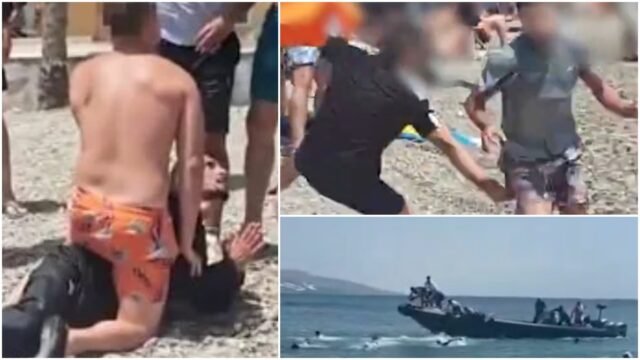 Reloj: Botones de sol enojados El rugby abordan a los migrantes al suelo después de que Dinghy toca tierra en la playa popular en Andalucia de España
